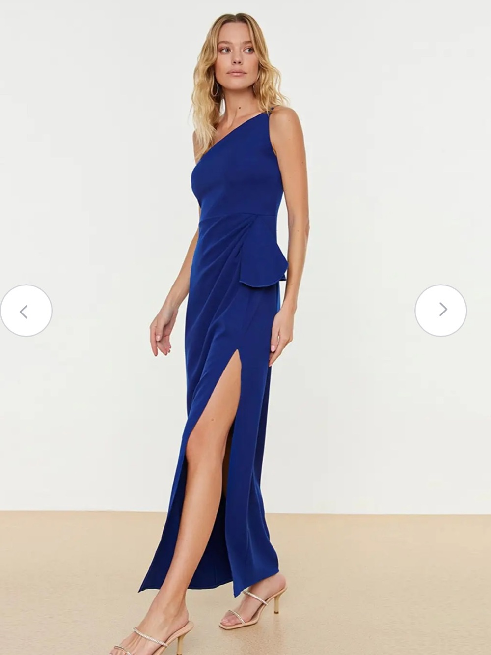 One shoulder long blue dress with slit and ruffle detail